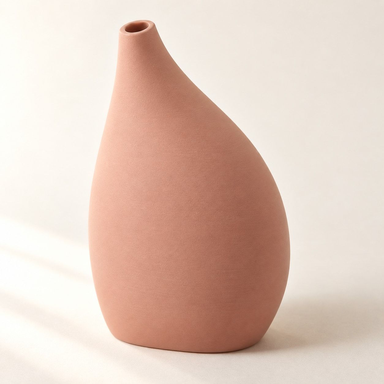 Soliflore rose en forme de goutte avec une petite ouverture supérieure